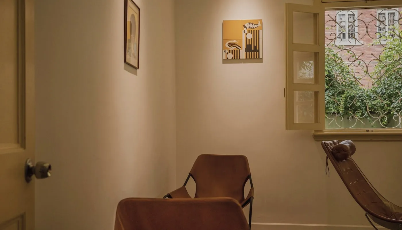 The waiting room at Northlight Dental, with chairs beside a tall window.