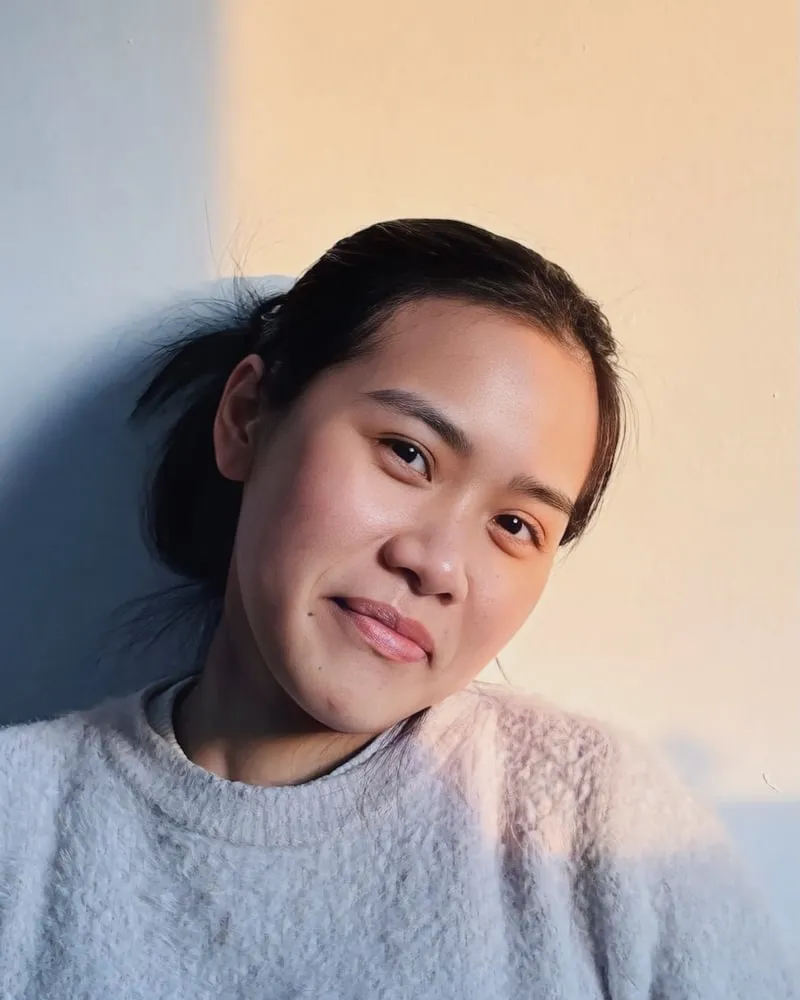 Dr Amelia Chen, dentist, photographed in soft daylight.